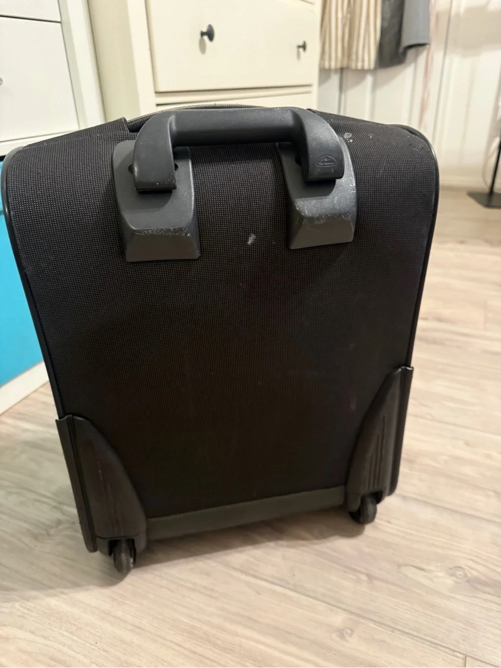 Samsonite Black Men's Carry-On Travel Bag with Front Zip Pocket